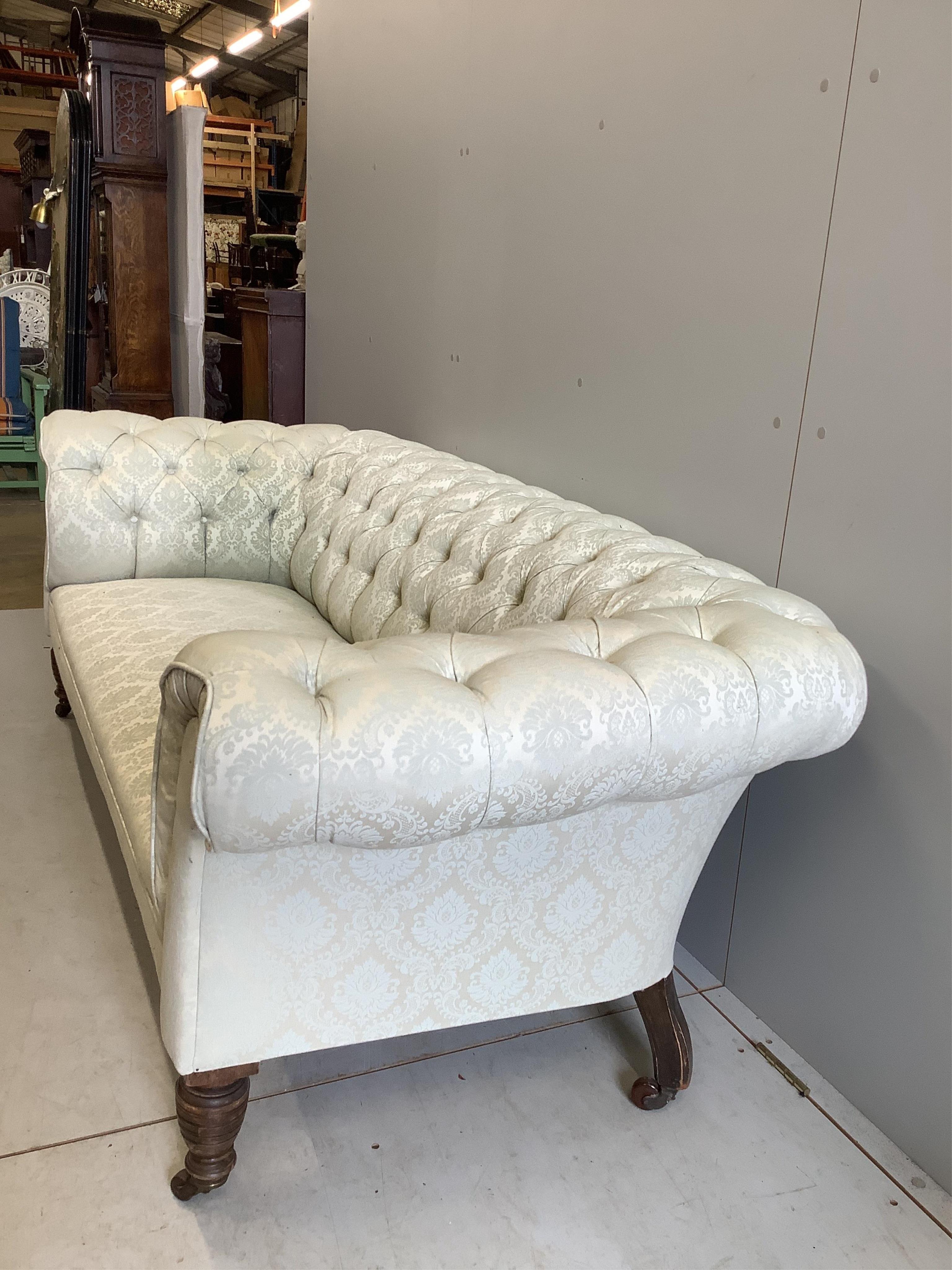 A late Victorian Chesterfield settee, width 196cm, depth 83cm, height 72cm. Condition - fair